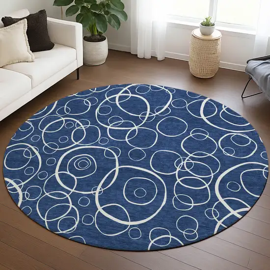 8' Navy Blue And Ivory Round Geometric Washable Indoor Outdoor Area Rug Photo 5
