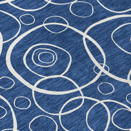 8' Navy Blue And Ivory Round Geometric Washable Indoor Outdoor Area Rug Photo 9
