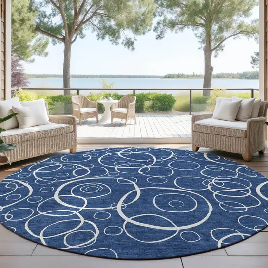 8' Navy Blue And Ivory Round Geometric Washable Indoor Outdoor Area Rug Photo 4