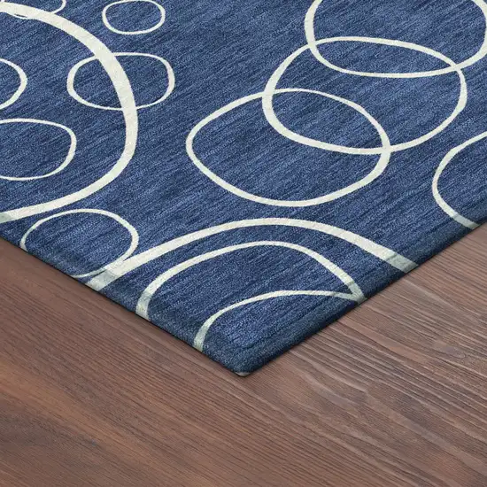 8' Navy Blue And Ivory Round Geometric Washable Indoor Outdoor Area Rug Photo 8