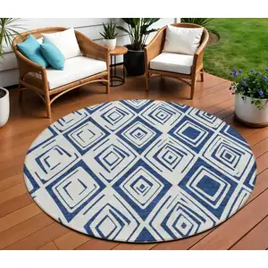 Photo of 8' Navy Blue And Ivory Round Geometric Washable Indoor Outdoor Area Rug