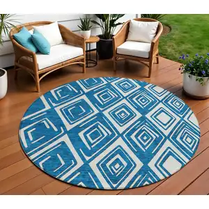 Photo of 8' Navy Blue And Ivory Round Geometric Washable Indoor Outdoor Area Rug