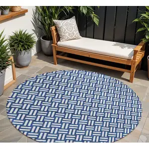 Photo of 8' Navy Blue And Ivory Round Geometric Washable Indoor Outdoor Area Rug