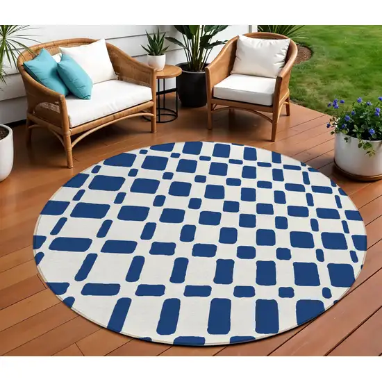 8' Navy Blue And Ivory Round Geometric Washable Indoor Outdoor Area Rug Photo 1
