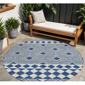 Photo of 8' Navy Blue And Ivory Round Geometric Washable Indoor Outdoor Area Rug