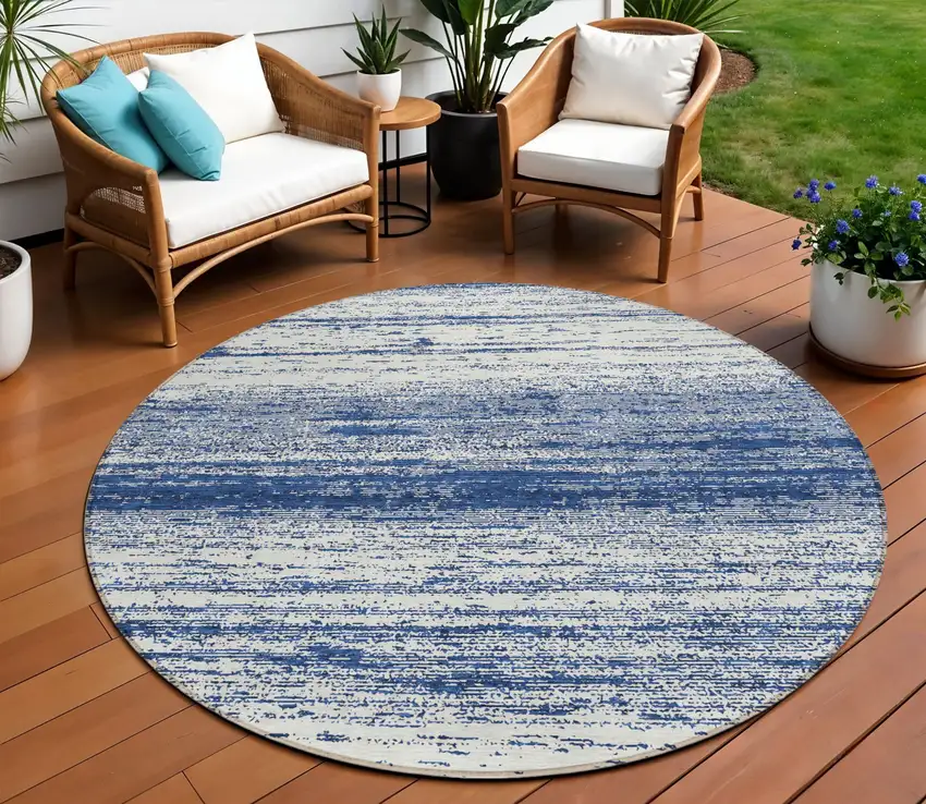 8' Navy Blue And Ivory Round Striped Washable Indoor Outdoor Area Rug Photo 1