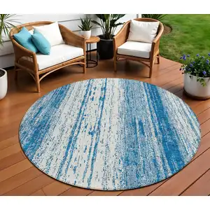 Photo of 8' Navy Blue And Ivory Round Striped Washable Indoor Outdoor Area Rug
