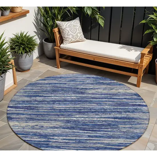 8' Navy Blue And Ivory Round Striped Washable Indoor Outdoor Area Rug Photo 1