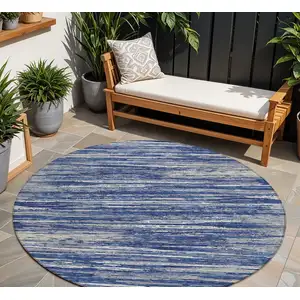 Photo of 8' Navy Blue And Ivory Round Striped Washable Indoor Outdoor Area Rug