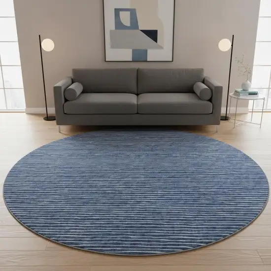 8' Navy Blue And Ivory Striped Washable Round Rug With UV Protection Photo 1