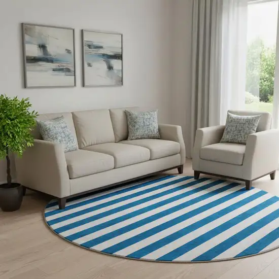 8' Navy Blue And Ivory Striped Washable Round Rug With UV Protection Photo 1