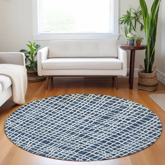 8' Navy Blue And Ivory Striped Washable Round Rug With UV Protection Photo 4