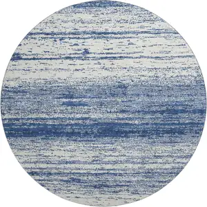 Photo of 8' Navy Blue And Ivory Striped Washable Round Rug With UV Protection