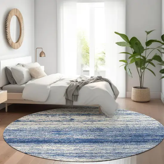 8' Navy Blue And Ivory Striped Washable Round Rug With UV Protection Photo 5