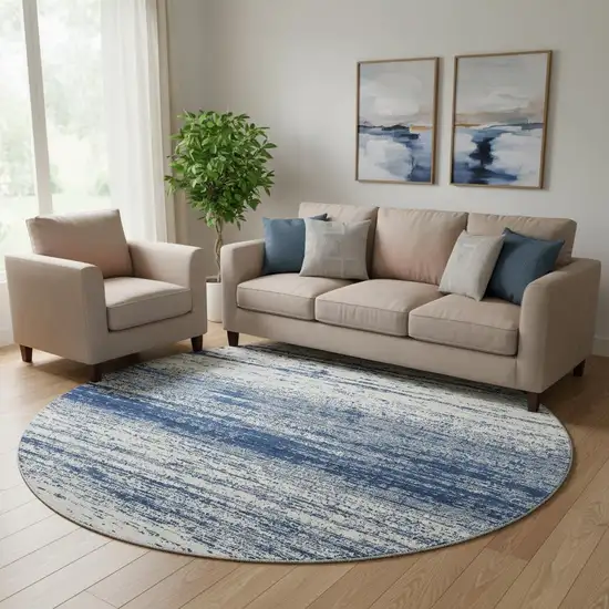 8' Navy Blue And Ivory Striped Washable Round Rug With UV Protection Photo 1