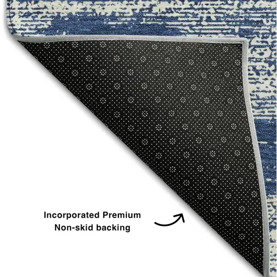 8' Navy Blue And Ivory Striped Washable Round Rug With UV Protection Photo 6