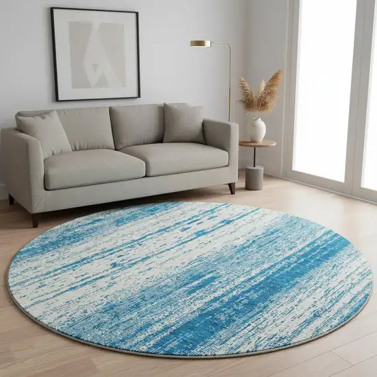 8' Navy Blue And Ivory Striped Washable Round Rug With UV Protection Photo 2