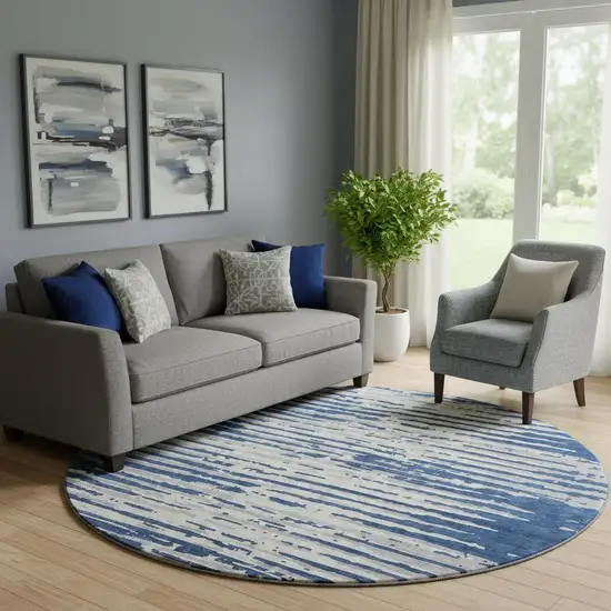 8' Navy Blue And Ivory Striped Washable Round Rug With UV Protection Photo 1