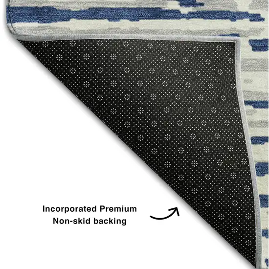 8' Navy Blue And Ivory Striped Washable Round Rug With UV Protection Photo 5