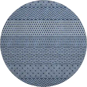 Photo of 8' Navy Blue And Ivory Striped Washable Round Rug With UV Protection
