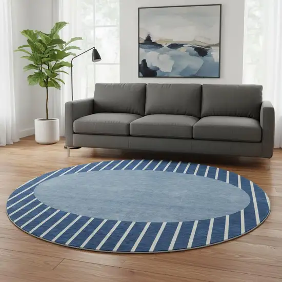 8' Navy Blue And Ivory Striped Washable Round Rug With UV Protection Photo 2