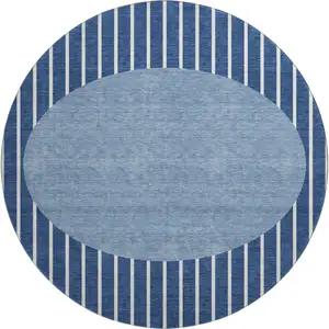 Photo of 8' Navy Blue And Ivory Striped Washable Round Rug With UV Protection