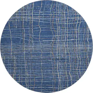 Photo of 8' Navy Blue And Ivory Striped Washable Round Rug With UV Protection