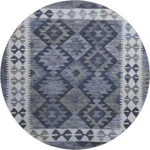 Photo of 8' Navy Blue And Ivory Tribal Washable Round Rug With UV Protection