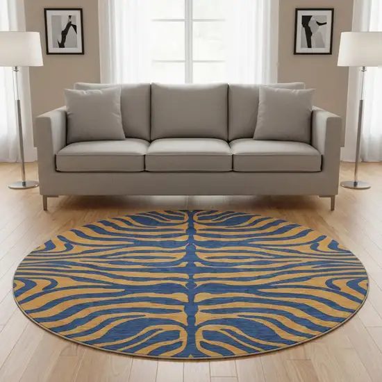 8' Navy Blue And Orange Animal Print Washable Round Rug With UV Protection Photo 2