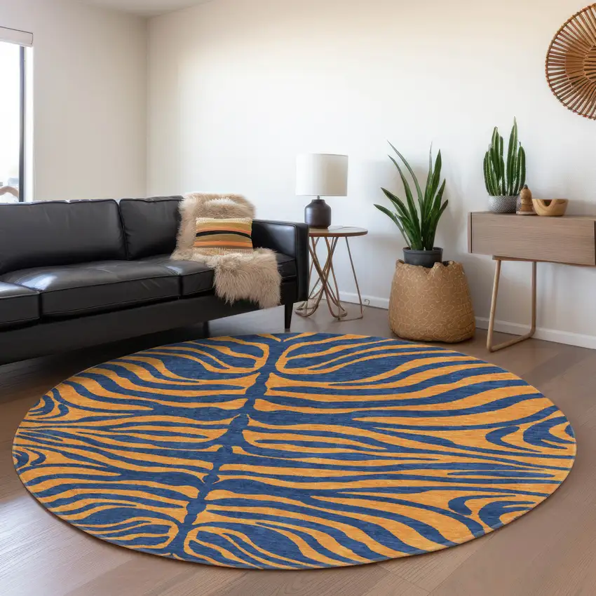 8' Navy Blue And Orange Animal Print Washable Round Rug With UV Protection Photo 4