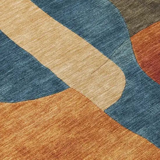 8' Navy Blue And Orange Round Abstract Washable Indoor Outdoor Area Rug Photo 9