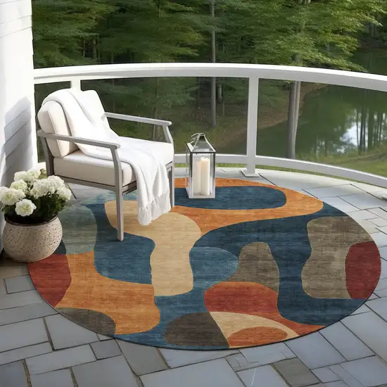 8' Navy Blue And Orange Round Abstract Washable Indoor Outdoor Area Rug Photo 5
