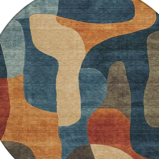 8' Navy Blue And Orange Round Abstract Washable Indoor Outdoor Area Rug Photo 3