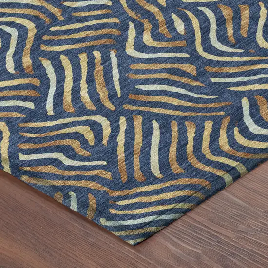 8' Navy Blue And Orange Round Abstract Washable Indoor Outdoor Area Rug Photo 6