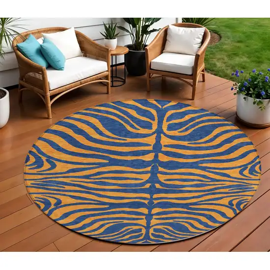 8' Navy Blue And Pink Round Animal Print Washable Indoor Outdoor Area Rug Photo 1