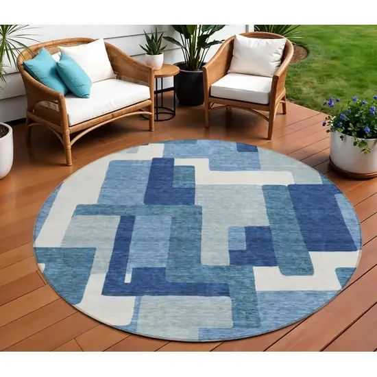 8' Navy Blue And Sky Blue Round Abstract Washable Indoor Outdoor Area Rug Photo 1