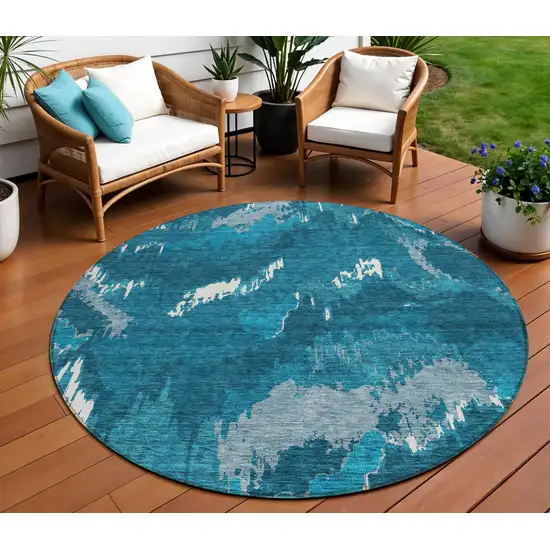 8' Navy Blue And Teal Blue Round Abstract Washable Indoor Outdoor Area Rug Photo 1