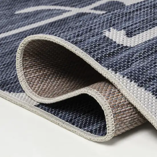 8' Navy Blue And White Animal Print Indoor Outdoor Runner Rug Photo 6