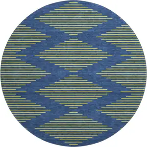 Photo of 8' Navy Blue And Yellow Geometric Washable Round Rug With UV Protection