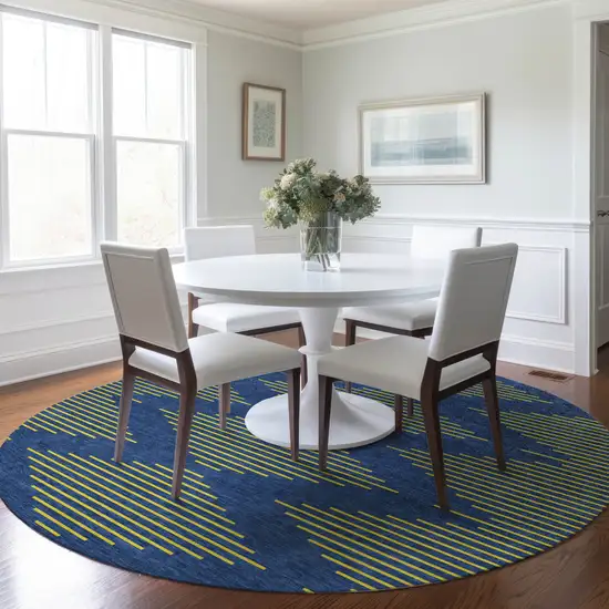 8' Navy Blue And Yellow Round Geometric Washable Indoor Outdoor Area Rug Photo 7
