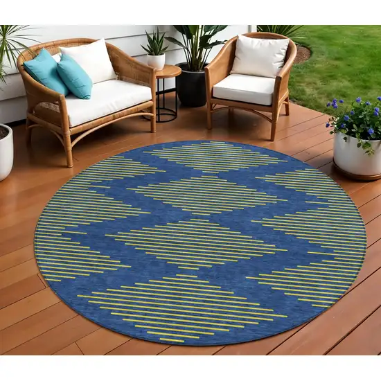 8' Navy Blue And Yellow Round Geometric Washable Indoor Outdoor Area Rug Photo 1
