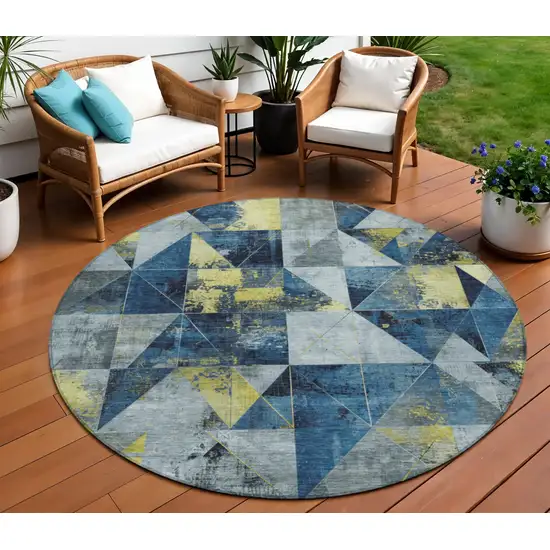 8' Navy Blue And Yellow Round Geometric Washable Indoor Outdoor Area Rug Photo 2