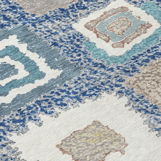 8' Navy Blue Beige And Ivory Round Geometric Washable Indoor Outdoor Area Rug Photo 9