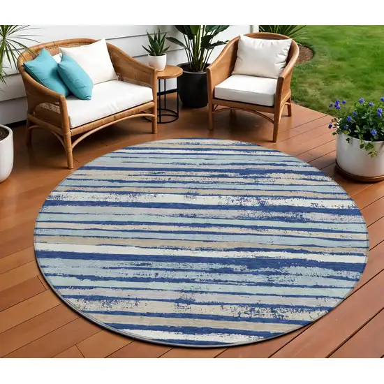 8' Navy Blue Beige And Ivory Round Striped Washable Indoor Outdoor Area Rug Photo 1