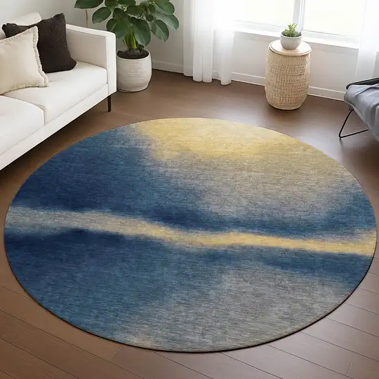 8' Navy Blue Gold And Beige Round Abstract Washable Indoor Outdoor Area Rug Photo 4