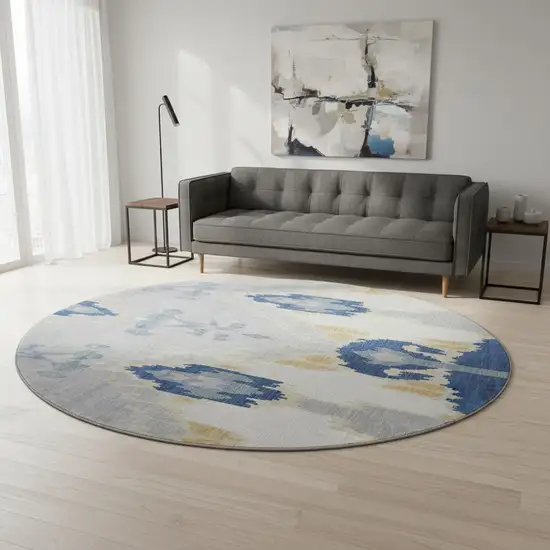 8' Navy Blue Gold And Ivory Ikat Washable Round Rug With UV Protection Photo 2