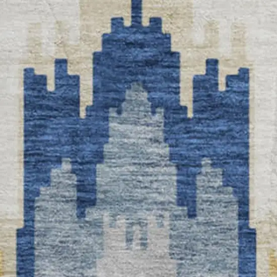 8' Navy Blue Gold And Ivory Ikat Washable Round Rug With UV Protection Photo 4