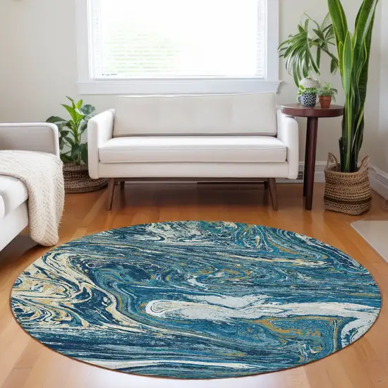 8' Navy Blue Gold And Ivory Round Abstract Washable Indoor Outdoor Area Rug Photo 9