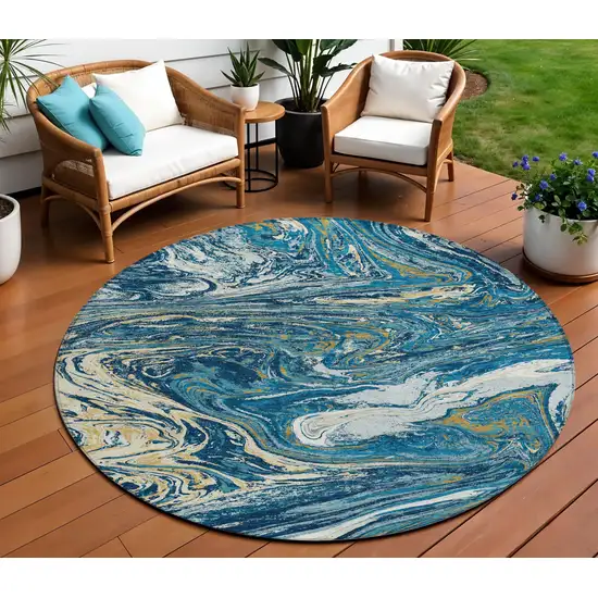 8' Navy Blue Gold And Ivory Round Abstract Washable Indoor Outdoor Area Rug Photo 1
