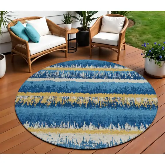8' Navy Blue Gold And Ivory Round Striped Washable Indoor Outdoor Area Rug Photo 1